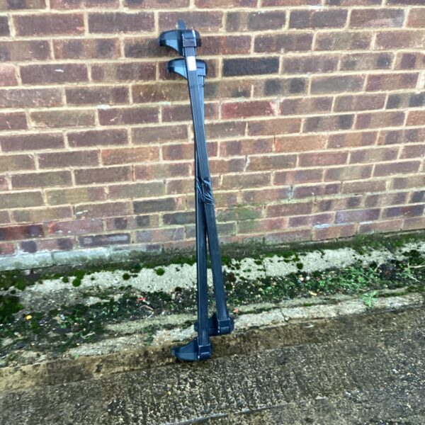 Used car roof bars with keys for vehicle transportation.