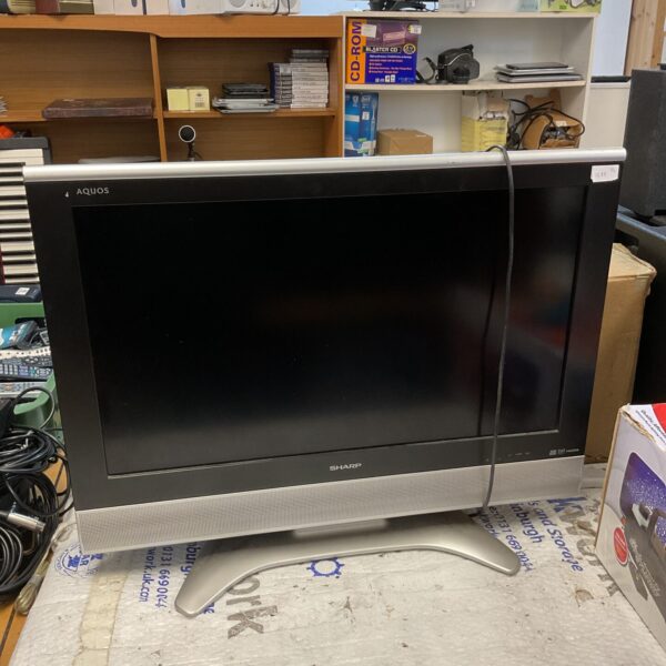Used Sharp Aquos 32" LCD TV for home entertainment.
