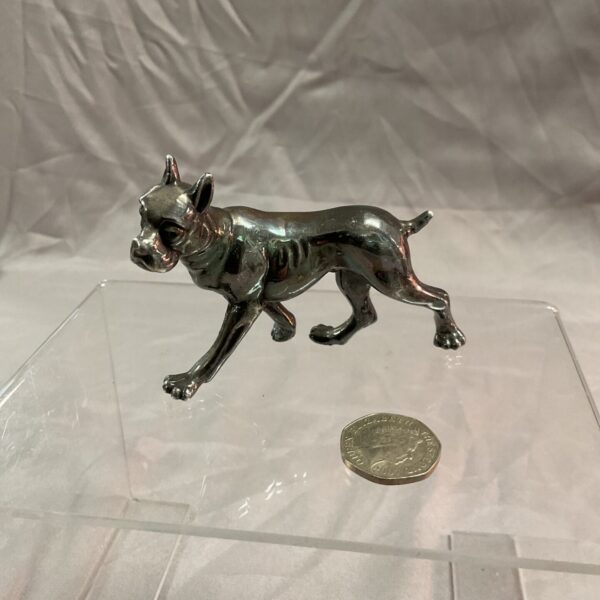 Detailed silver bulldog figure, a collectible animal sculpture.