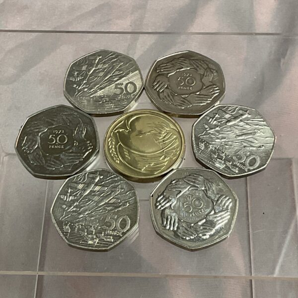 Lot of six 50p coins commemorating a 50th anniversary.