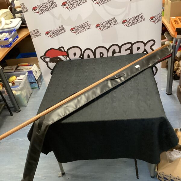 Six-foot wooden kendo stick for martial arts training.