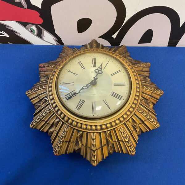 Vintage Smiths sunburst wall clock, mid century design.