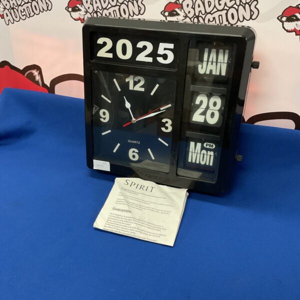 Vintage Spirit day date wall clock with clear display.