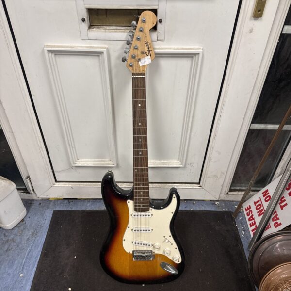 Sunburst Squier Stratocaster electric guitar for restoration.