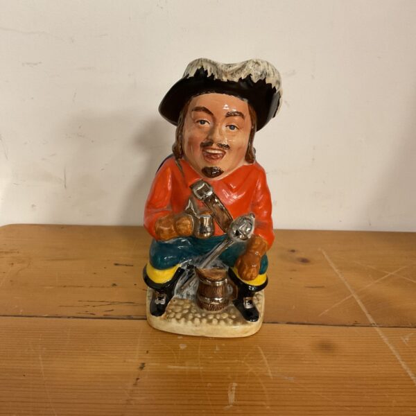 Vintage Staffordshire musical cavalier character jug, detailed pottery.