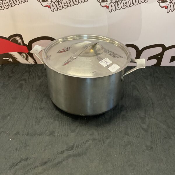 Large stainless steel stockpot for cooking and kitchen use.
