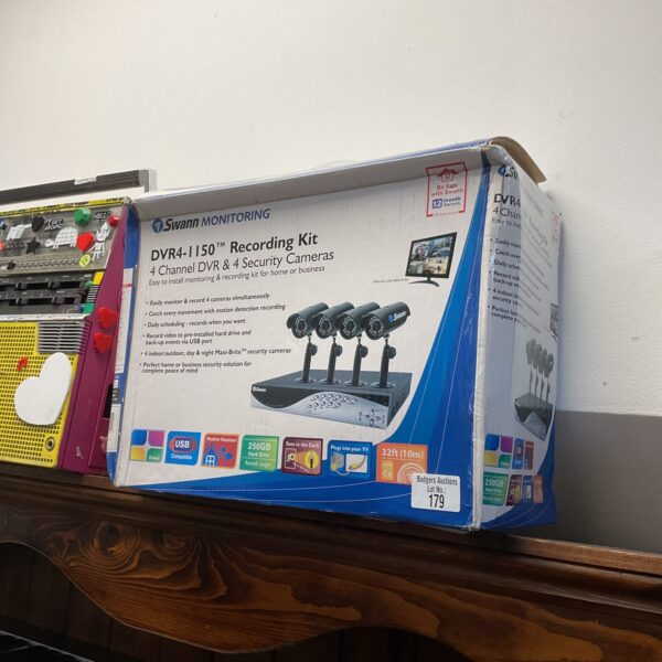 Swann CCTV security system kit with DVR and cameras.