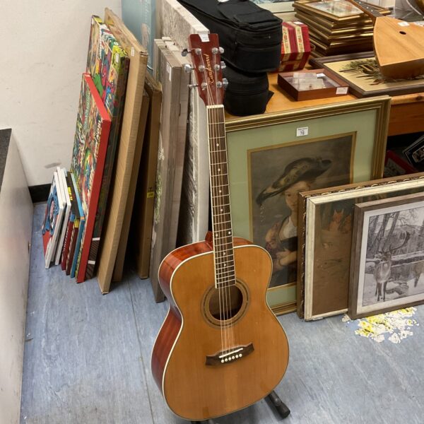 Natural finish Tanglewood acoustic guitar, six-string instrument.