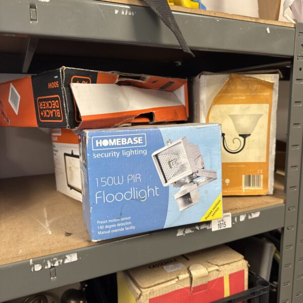 Black & Decker floodlight and assorted outdoor lighting fixtures.