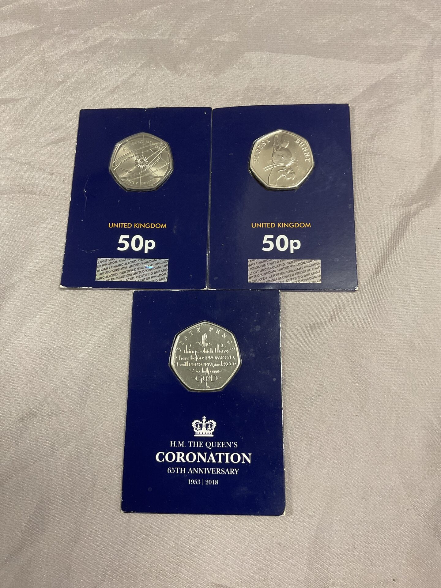 817 Three Change checker 50p coins Inc flopsy bunny