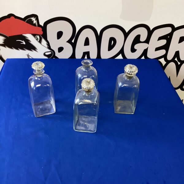 Antique Georgian decanter lot with three blown glass examples.