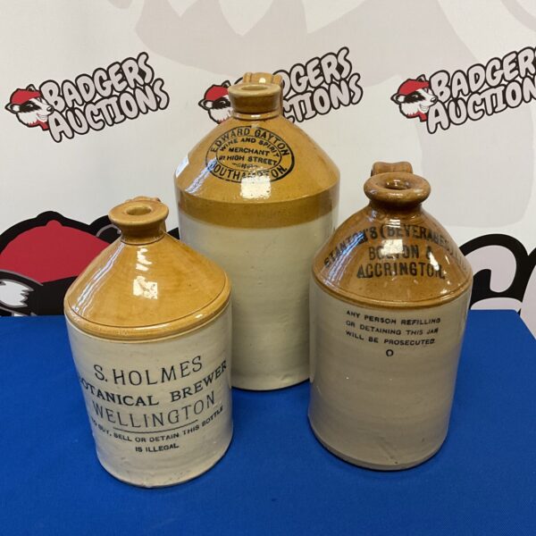 Antique salt glazed flagons by S Holmes and Edward Gayton.