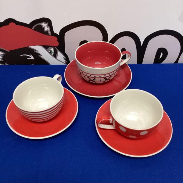Vintage Whittard of Chelsea tea cup and saucer set on display.