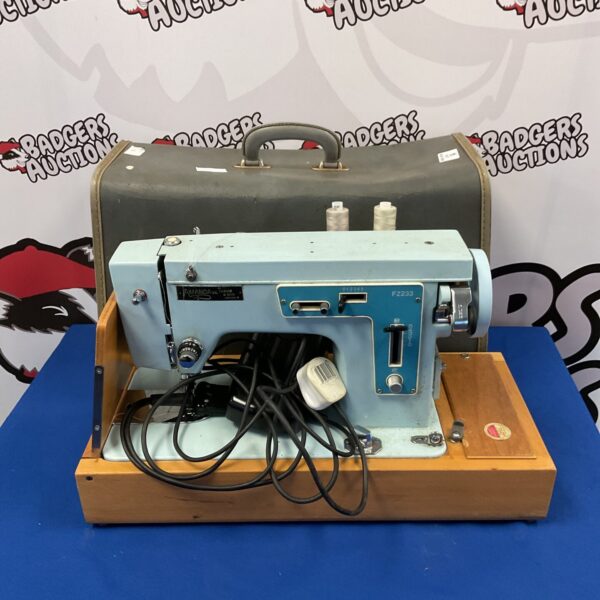 Vintage Tobias & Son Amanda FZ233 sewing machine in portable case.