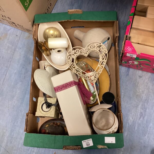 Mixed lot of assorted tea light holders for warm ambient lighting.