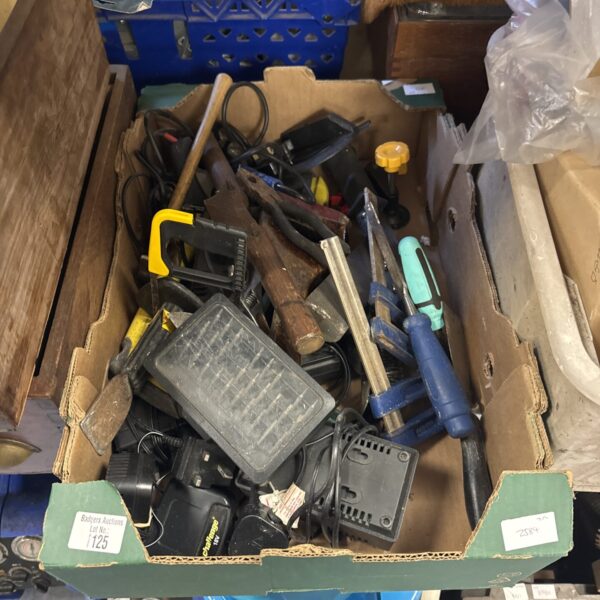 Assorted garden and hand tools in a shed clearance lot.