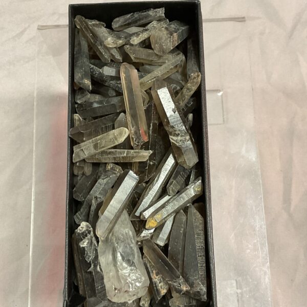 Tray of unpolished crystals for collection or display.