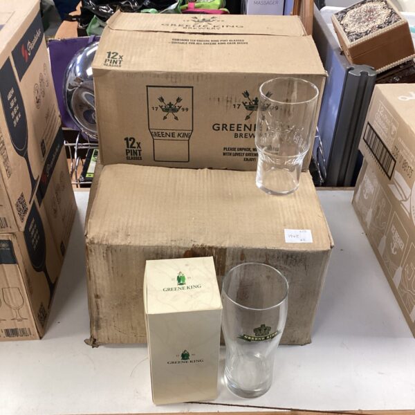 Lot of twenty-four Greene King branded pint glasses for beer.