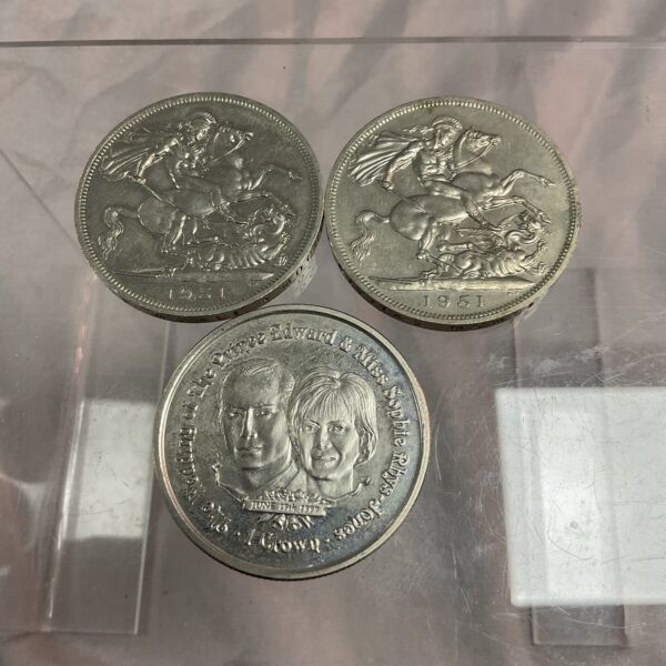 Two 1951 Festival of Britain crowns featuring Saint George and the Dragon.