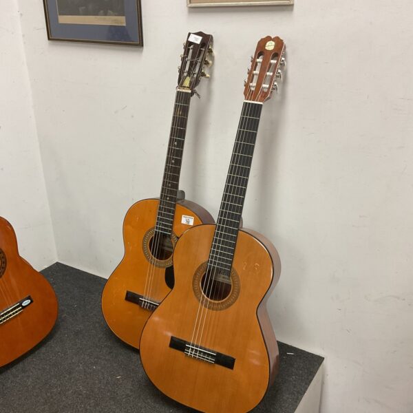 Pair of vintage acoustic guitars, Spanish style, for sale.