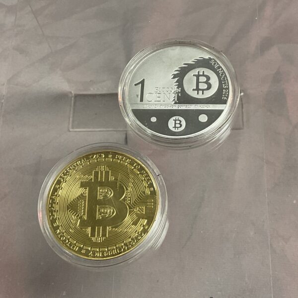 Gold-toned Bitcoin coin with circuit board design.