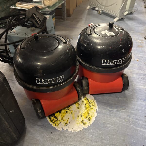 Two red Numatic Henry Hoover bodies for spares or restoration.