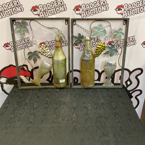 Vintage metal wine bottle wall decor pair for rustic kitchens.