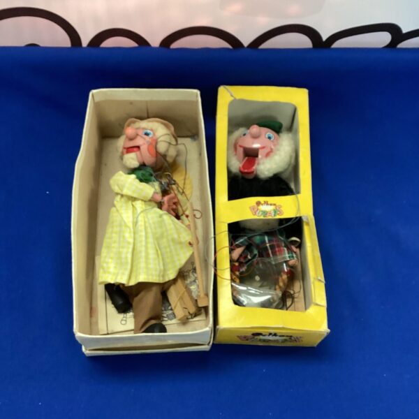 Pair of vintage Pelham Puppets, classic string marionettes.