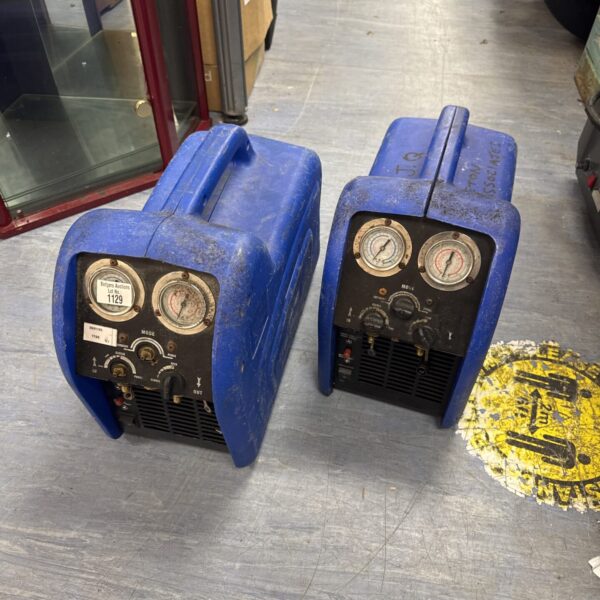 Blue portable car air conditioning machine with gauges and dials.