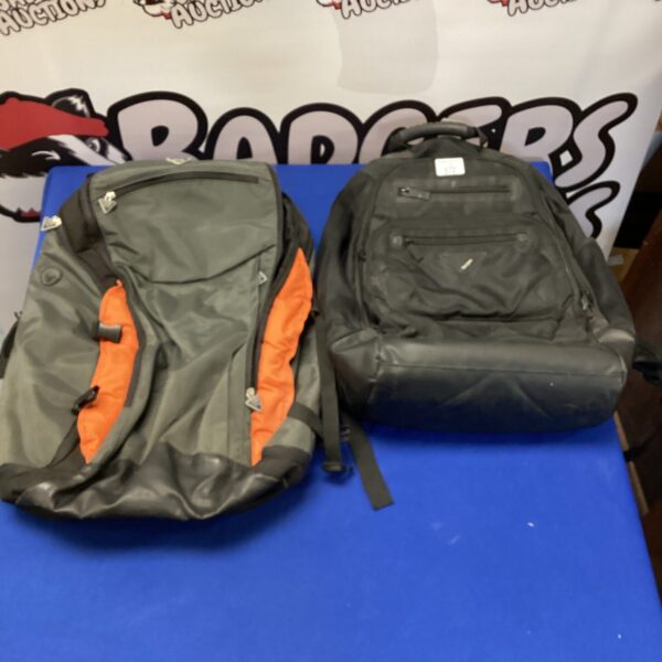 Two rucksacks, including a Targus example, in used condition.