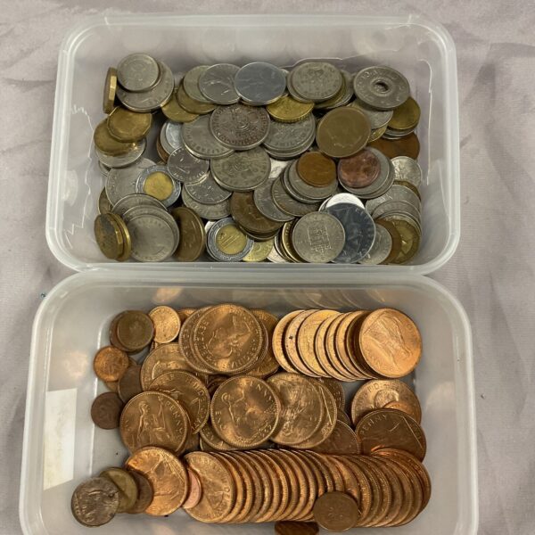 Tub of mixed coins, bulk currency collection for collectors.