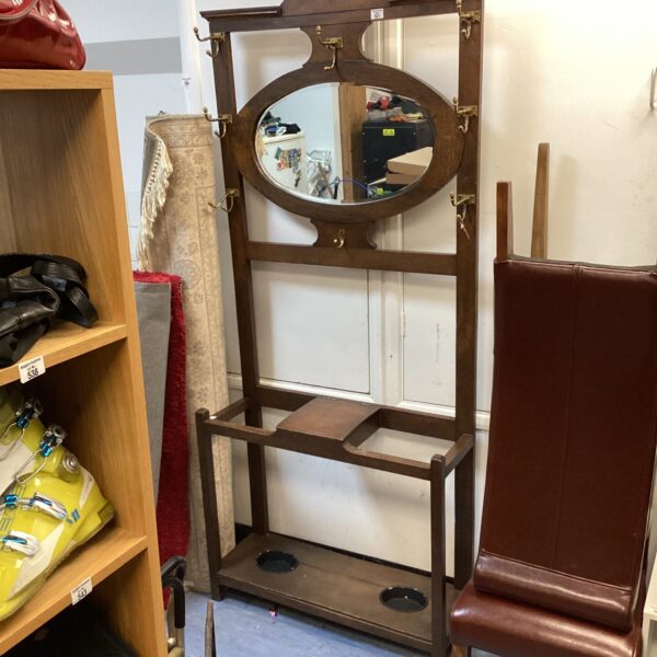 Antique Victorian hallway coat stand with mirror and umbrella holder.