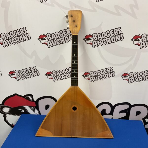 Vintage three-string balalaika, a classic Russian folk instrument.