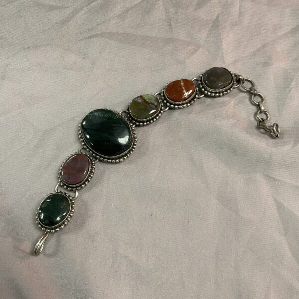 Vintage silver tone bracelet with polished agate stones.