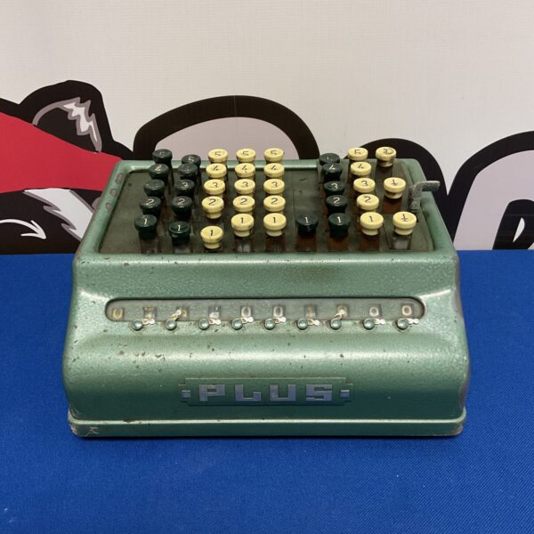 Vintage Bell Punch mechanical calculator, antique computing device.