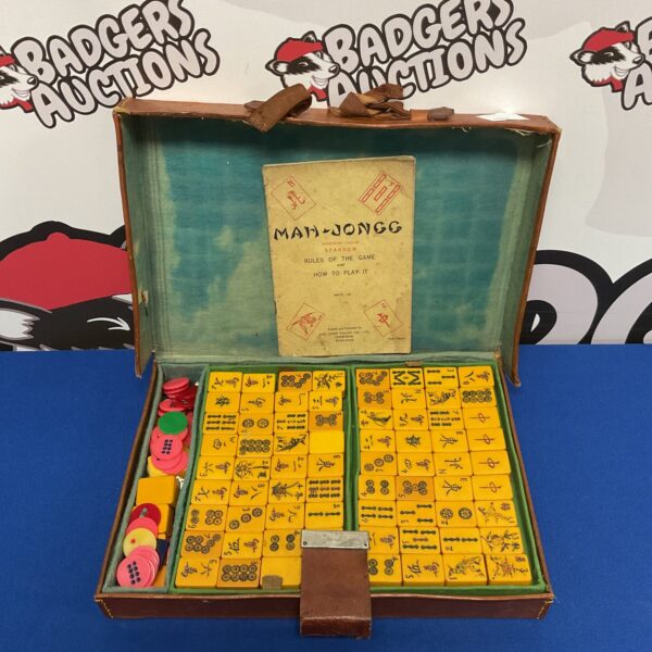 Vintage Chad Valley Mahjong set in a worn leather case.