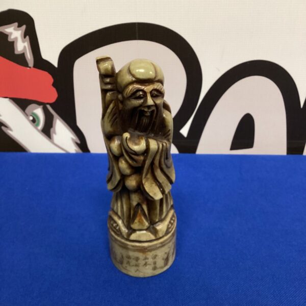 Detailed vintage Chinese soapstone carving of a wise man figurine.