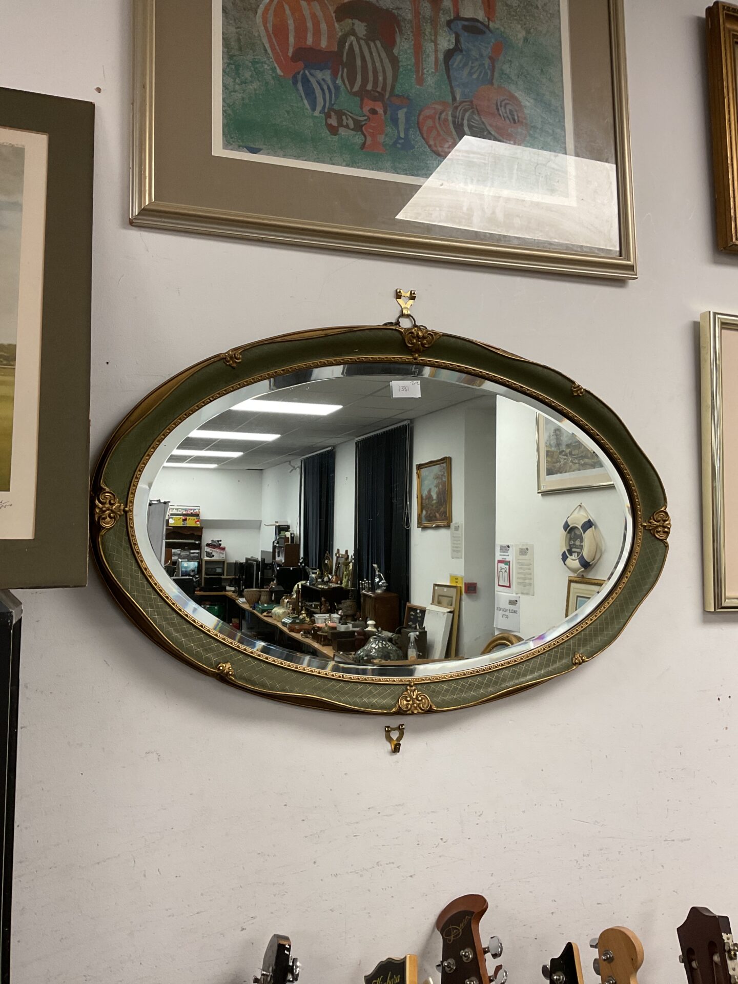 734 Vintage gilt framed bevel edged oval mirror
