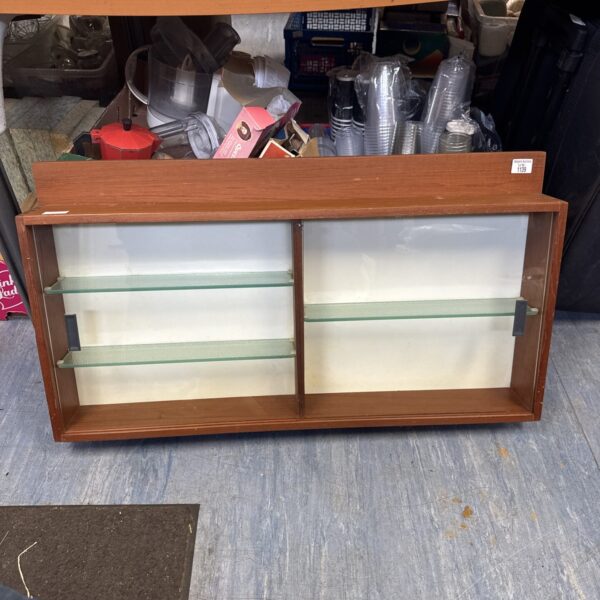 Vintage glass display cabinet with wooden frame.