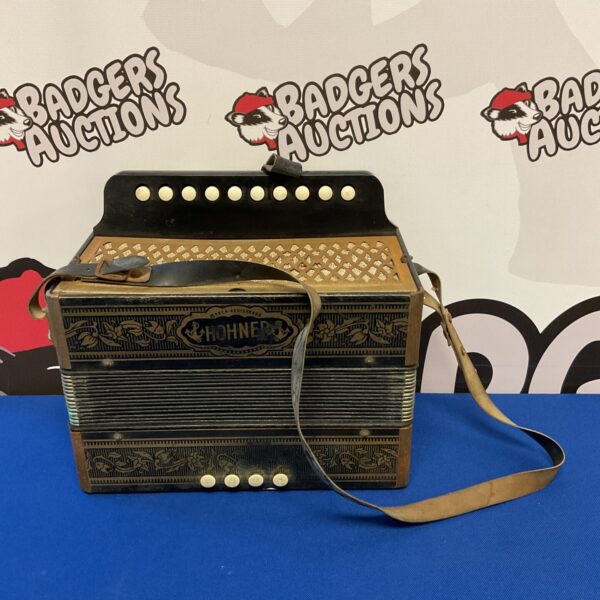 Vintage Hohner 10 key accordion in good condition.