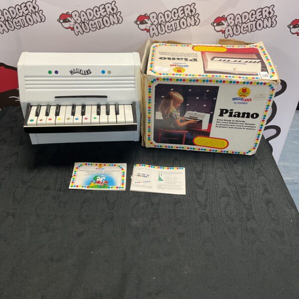 Vintage Hohner Musikland piano, colourful 1980s toy keyboard.