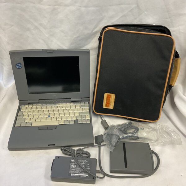 Vintage NEC Versa S/50 laptop with carrying case.
