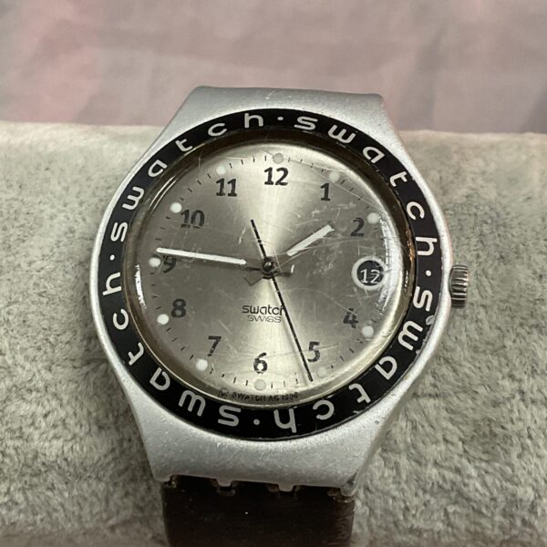 Vintage Swatch Irony quartz wristwatch with minimalist dial.