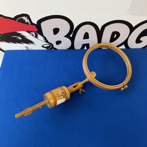 Vintage wooden embroidery hoop for sewing and needlework.
