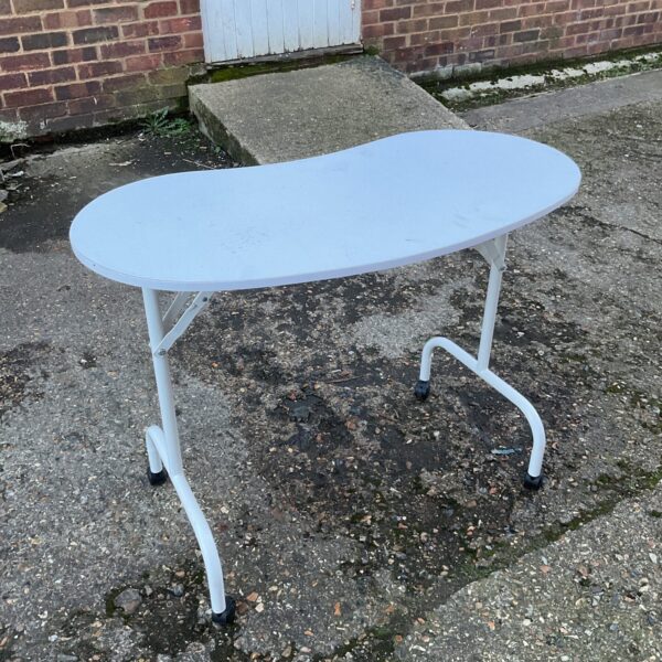 White folding kidney table on wheels, vintage style.