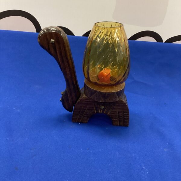 Detailed wooden tortoise candle holder with glass insert.