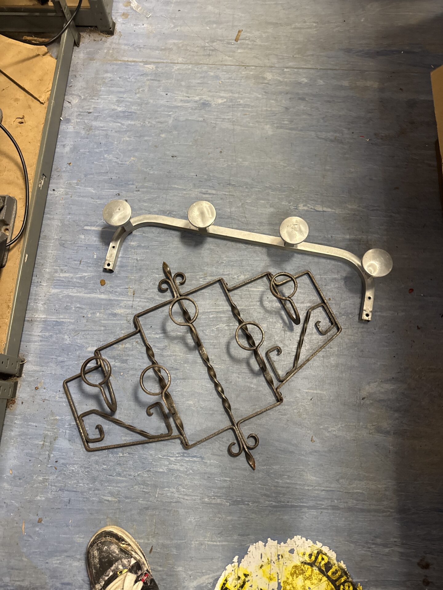1107 Wrought iron hanging bracket (23” width) with coat rack