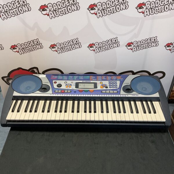 Yamaha PSR-260 keyboard with keys and control panel visible.