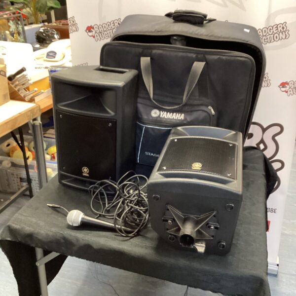 Yamaha Stagepas 300 PA system with speaker and microphone.