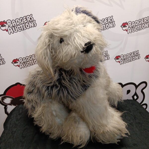 Large vintage Old English Sheepdog plush toy, showing signs of wear.